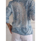 V-halset bluse med stjerneprint og knapper