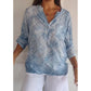 V-halset bluse med stjerneprint og knapper