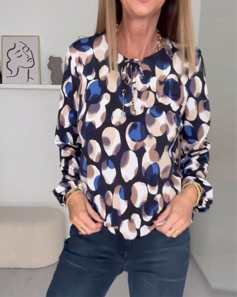 Elegant bluse med stropper og print