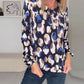 Elegant bluse med stropper og print